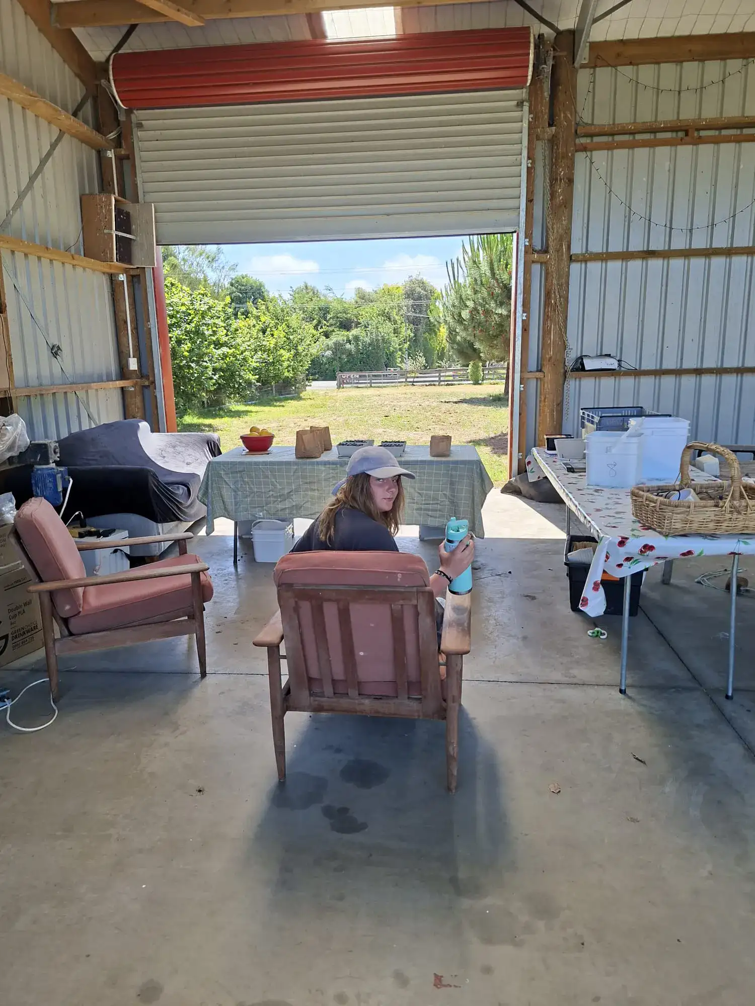 Amber serving customers in the CloudyAcres farm shop